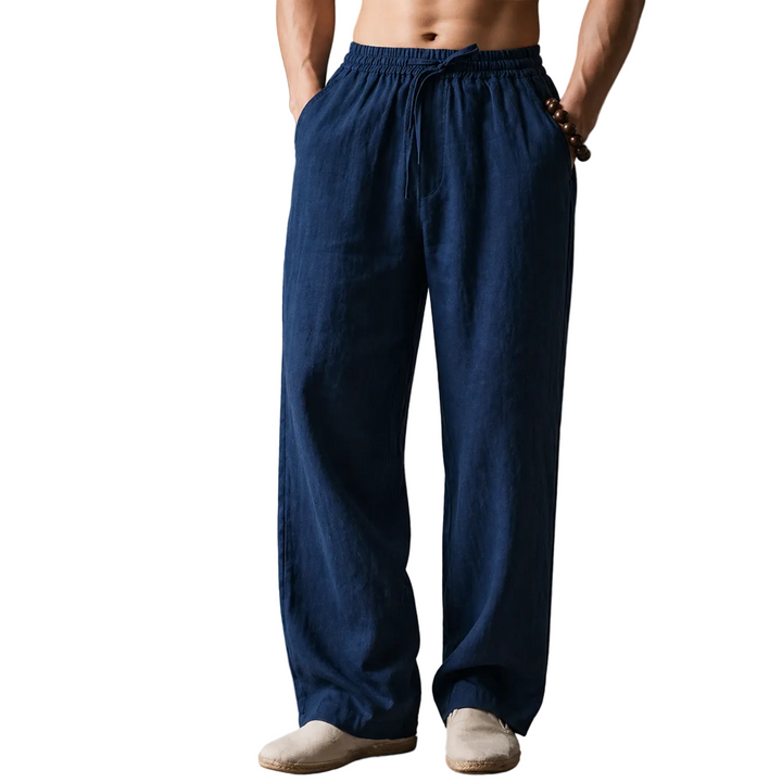 Person wearing navy blue pants against a white background