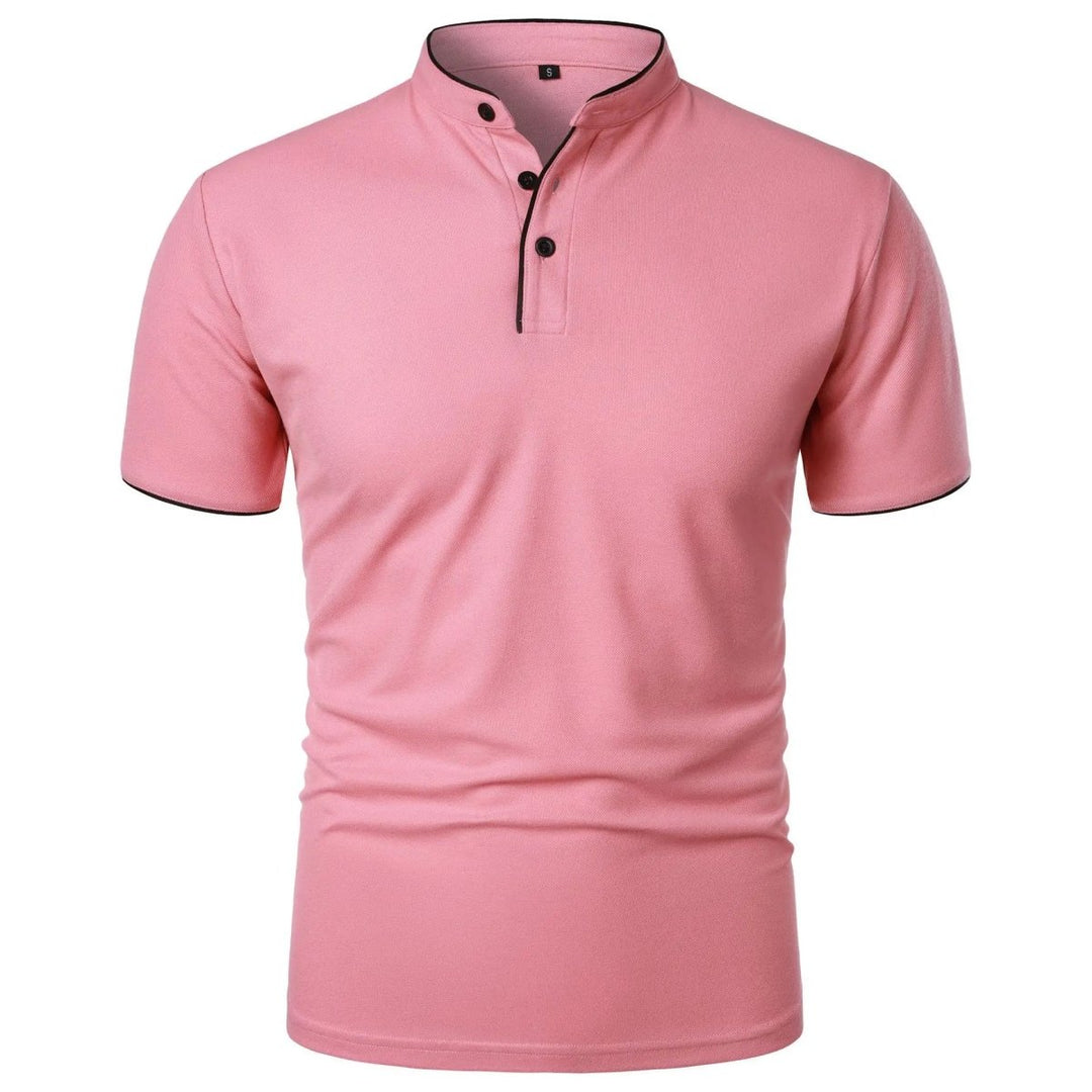 Pink polo shirt with black buttons on a white background