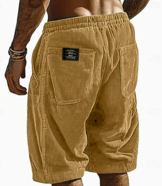 Beige corduroy shorts with a visible brand label on a white background