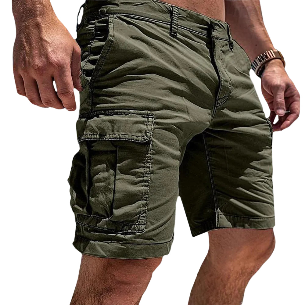 Green cargo shorts worn by a person on a white background
