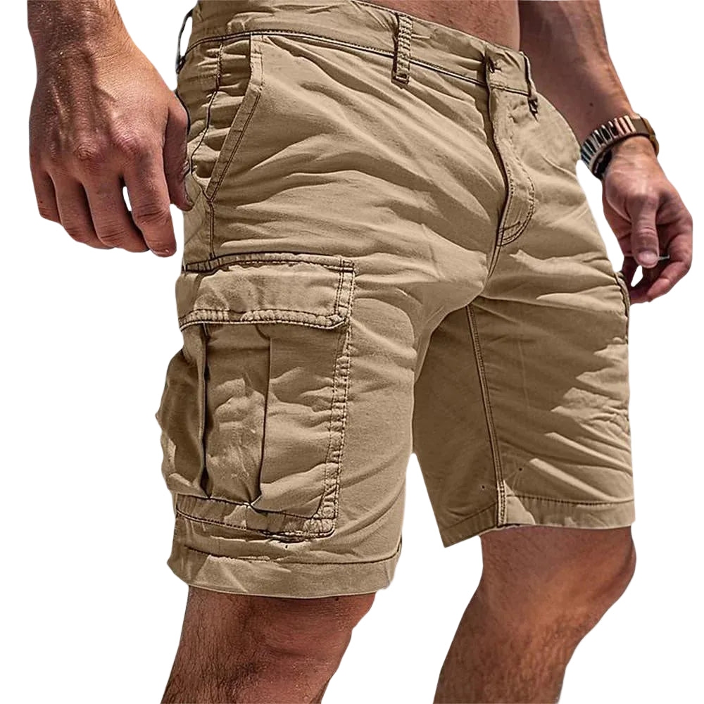 Beige cargo shorts worn by a person on a light white background