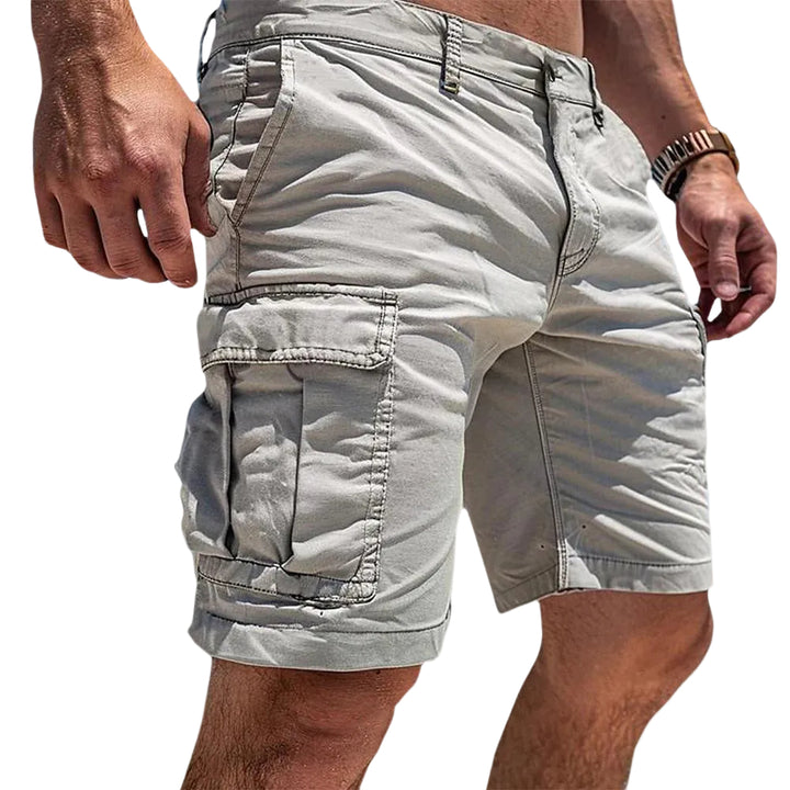 Light gray cargo shorts worn by a person on a white background