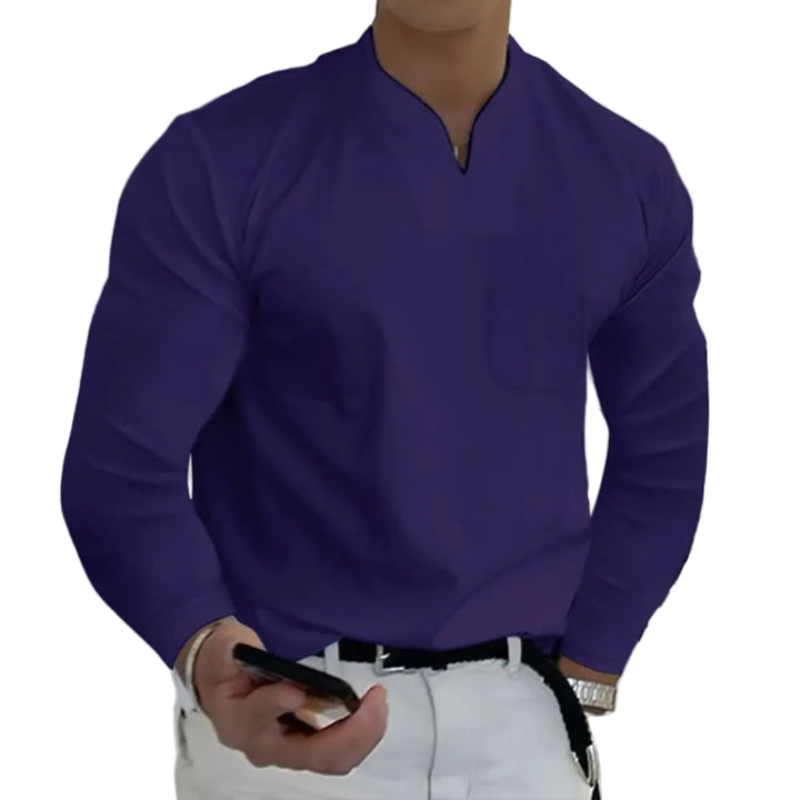 Person wearing a purple long-sleeve shirt holding a phone against a white background
