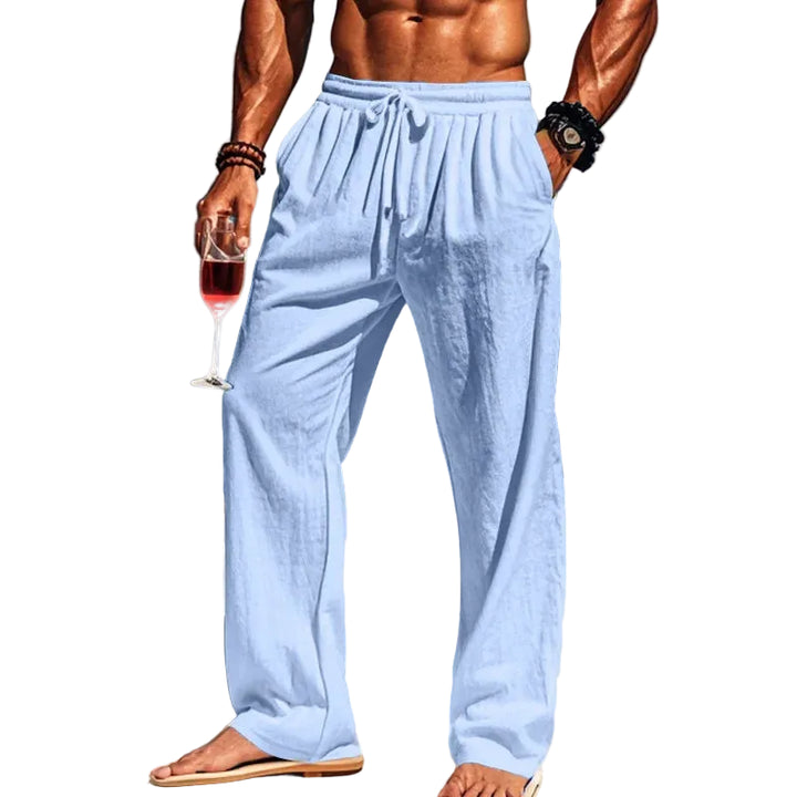 Person wearing light blue pants on a boat with a white background