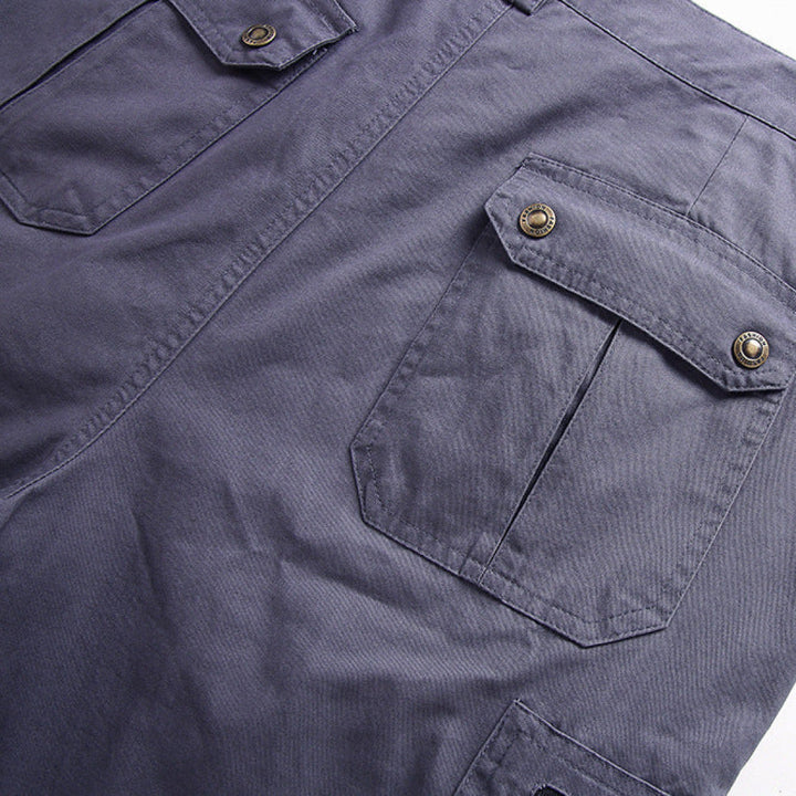 Close-up of a navy blue shirt with buttoned pockets