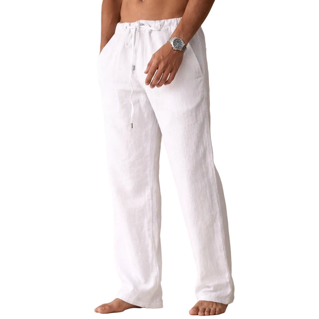 Person wearing white pants against a white background