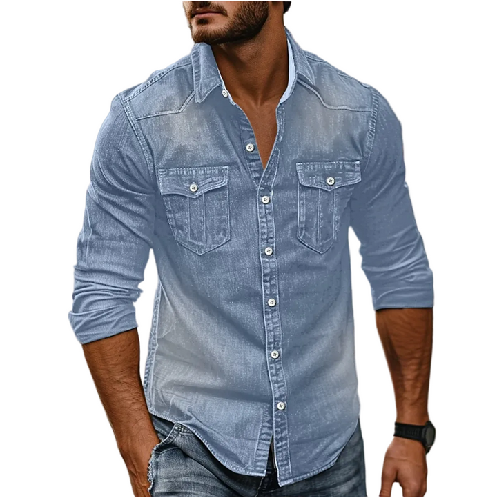 Man wearing a light blue denim shirt with a white background